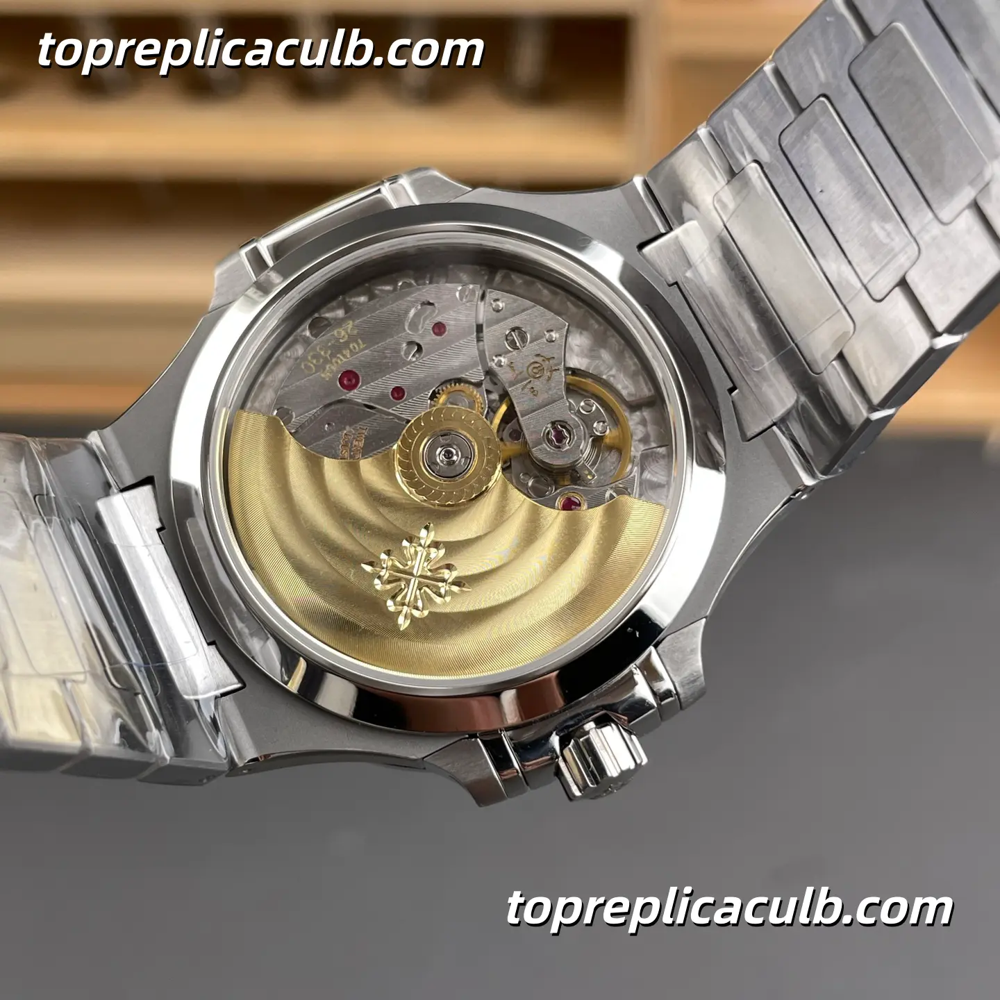 PPF Factory Patek Philippe Nautilus Ladies 7118/1200A-001 Diamond Bezel Super Clone Watch 35.2mm Blue Wave Dial Stainless Steel Bracelet Automatic Movement - Image 5
